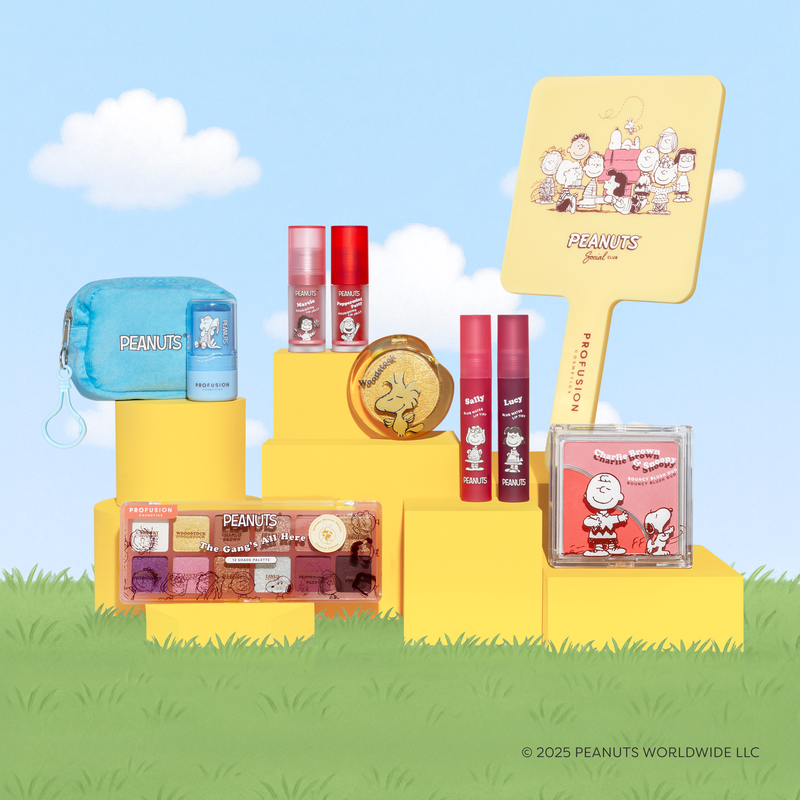 Collection of Peanuts 75th Bundle Sets including lip balms, Mirror, pouch with lip balm, lip tint, lip oil, face highlighter, face blush and eyeshadow palette.