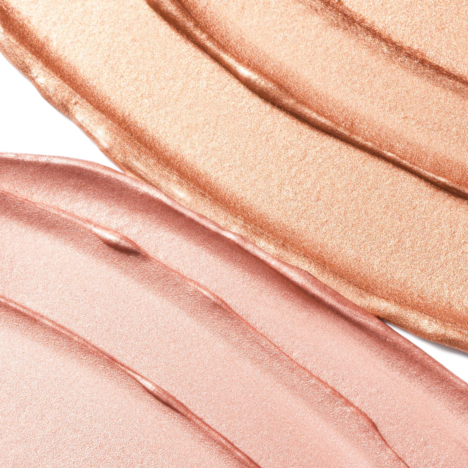 Swatches of shimmery pink and peach makeup from Profusion Cosmetics.