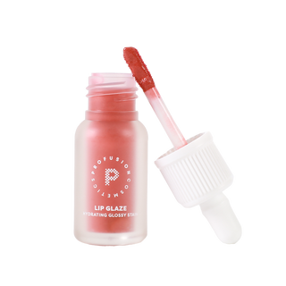 Profusion Cherry lip glaze in an open frosted bottle with the applicator wand showing the rich cherry-pink glossy shade.