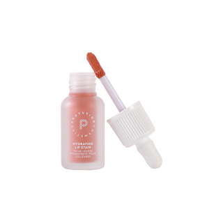 Profusion Peach Glaze hydrating lip stain in an open frosted bottle with the applicator wand showing the soft peach shade.