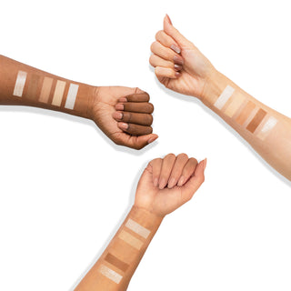 Neutral matte and shimmer powder swatches on three different skin tones.