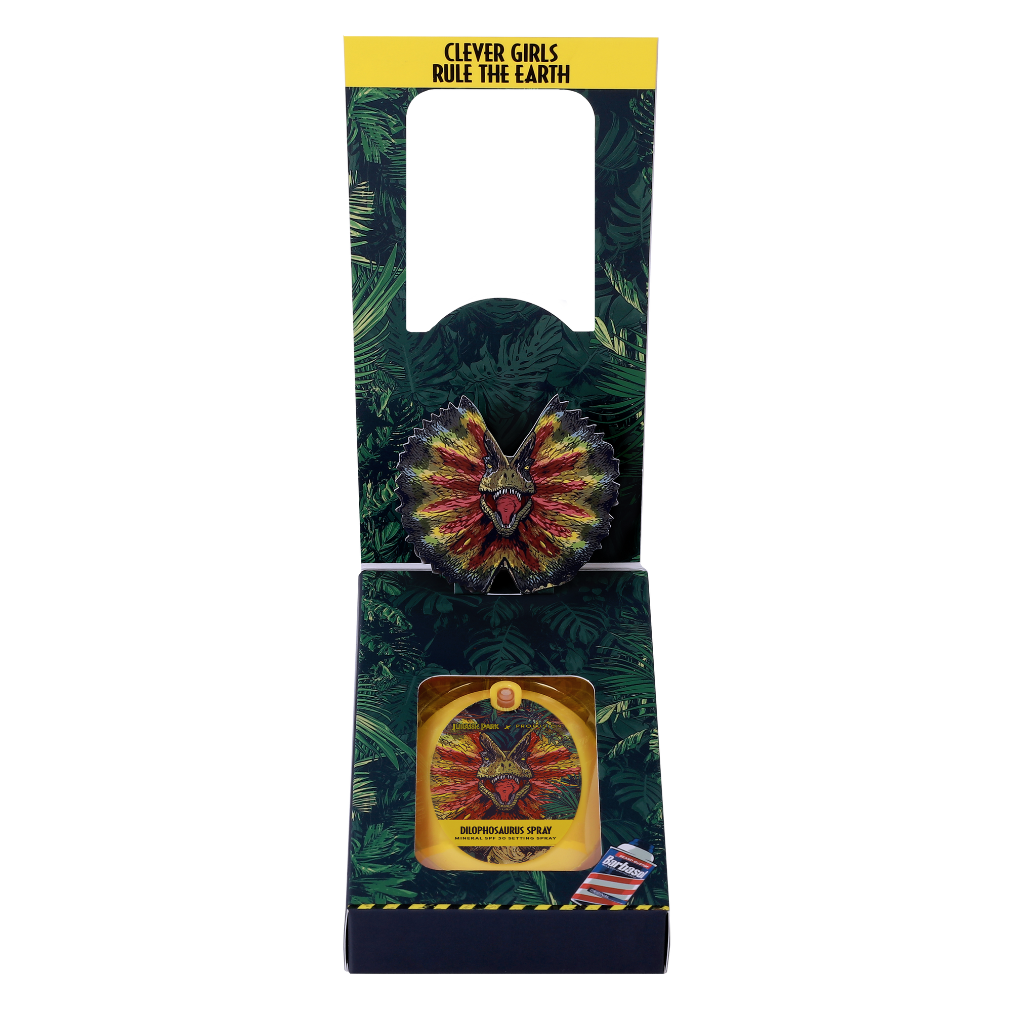 spray in packaging and front cover flips open with design of leaves and a pop up of a Dilophosaurus