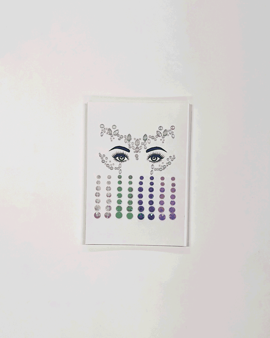 Profusion Cosmetics "It's A Vibe" face and body gems set, including colorful, glow-in-the-dark gems in various shapes and sizes.