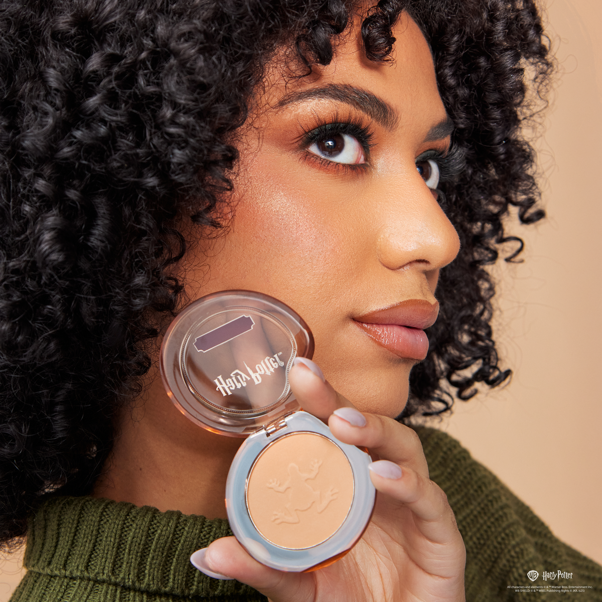 Harry Potter Holiday | Chocolate Frog™ Bronzer Powder model with product